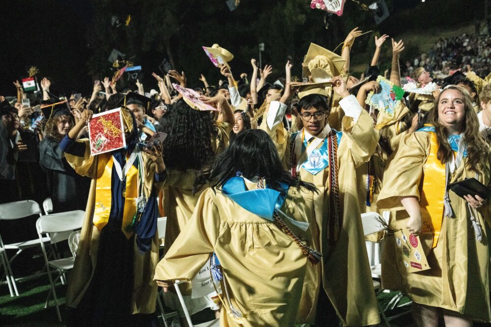 Golden Valley High School graduates toss their caps in celebration at the end of the class of 2026 commencement ceremony on Tuesday June 2, 2026 at College of the Canyons. Katherine Quezada/The Signal