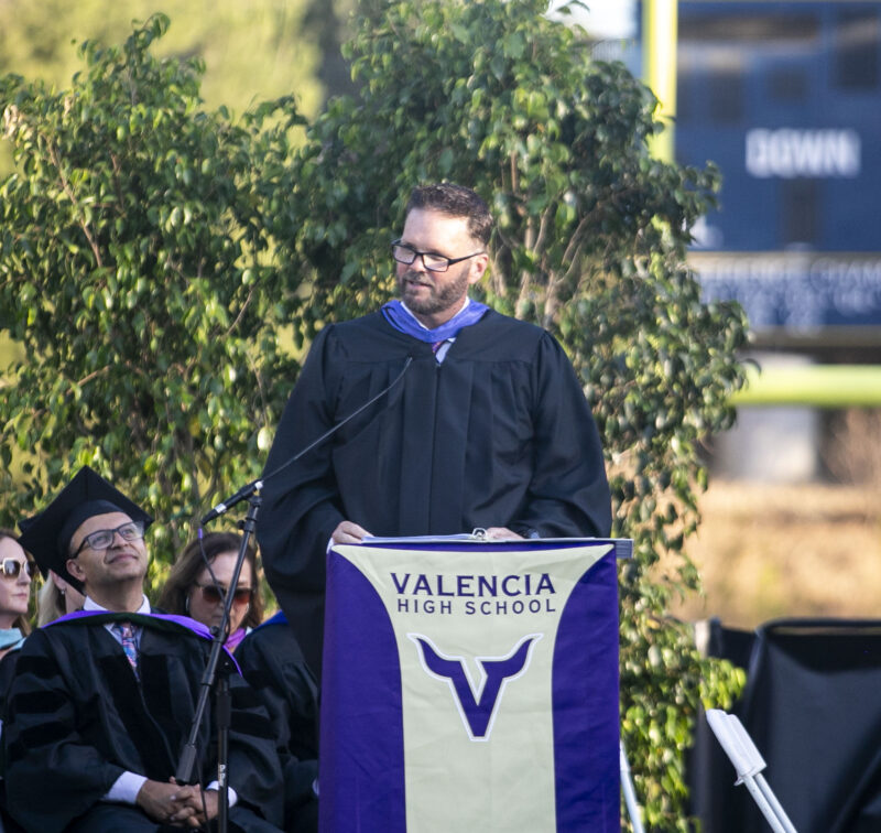 Principal Kullen Welch welcomes the students and their family and friends to the commencement ceremony during the Valencia High School graduation at College of the Canyons on Wednesday, June 3, 2026. Habeba Mostafa/ The Signal