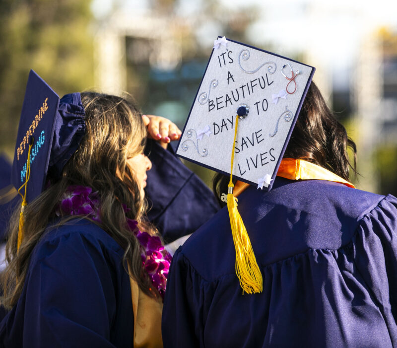 Graduating students walk to "Pomp and Circumstance" during the College of the Canyons graduation at Cougar Stadium on Friday, June 5, 2026. Habeba Mostafa/ The Signal