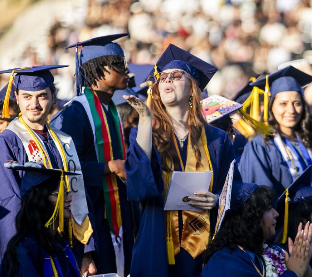 Graduating students recognize loved ones in the crowd during the College of the Canyons graduation at Cougar Stadium on Friday, June 5, 2026. Habeba Mostafa/ The Signal