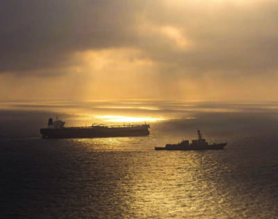 Arleigh Burke-class guided-missile destroyer USS Rafael Peralta (DDG 115) enforces a maritime blockade against an Iranian-flagged ship attempting to sail toward an Iranian port, on April 24, 2026. U.S. Navy photo