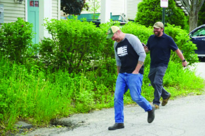 Graham Platner and a staffer leave a campaign event in Belfast, Maine, on June 6, 2026, just days ahead of the state's June 9 primary. The boutique oysterman and U.S. Marine Corps veteran hopes to oust Sen. Susan Collins (R-Maine) in November. Photo by Nathan Worcester.