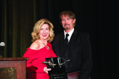 Marlee Lauffer, the 2025 Silver Spur honoree, presents this year’s award to Ed Masterson. Photo courtesy of Brooke Ritter.