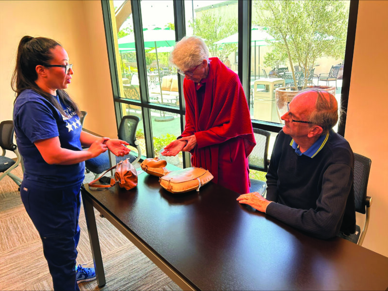 Staff from Henry Mayo Newhall Hospital recently conducted a series of free “hands-only CPR” training sessions for the public at the hospital, the Henry Mayo Fitness and Health club and at the Bella Vida Santa Clarita Valley Senior Center. Henry Mayo nurse Monique Avalos is shown here conducting the training at the senior center. Photo courtesy of HMNH.