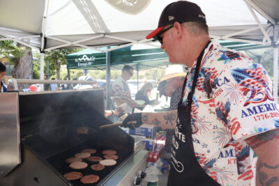 Brian Frost grills hamburgers for attendees at the America 250 All-American BBQ at Veterans of Foreign Wars Post 6885 in Canyon Country, Calif., Sunday, June 14, 2026. Kamryn Martell/The Signal