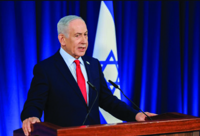 Israeli Prime Minister Benjamin Netanyahu speaks during a press conference in Jerusalem on March 19, 2026. Ronen Zvulun, Pool Photo via AP