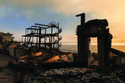 The rubble of homes that burned down on Pacific Coast Highway near Malibu, as a result of the Palisades Fire. Jan. 9, 2025. Photo by Ted Soqui for CalMatters
