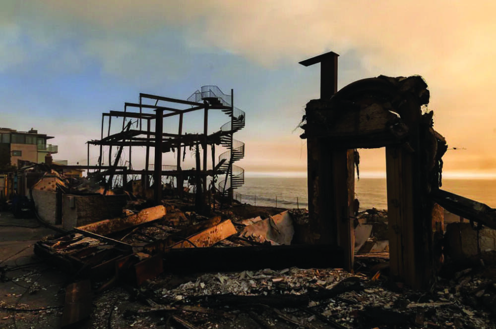 The rubble of homes that burned down on Pacific Coast Highway near Malibu, as a result of the Palisades Fire. Jan. 9, 2025. Photo by Ted Soqui for CalMatters