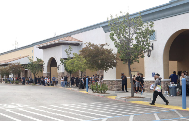 People wait in line for Pokémon cards at Sam's Club in Canyon Country, Calif., Tuesday, July 21, 2026. Kamryn Martell/The Signal