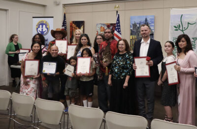 Honorees and community members pose for a photo at the inaugural National Parents Day awards ceremony at the Old Town Newhall Library in Newhall, Calif., Sunday, July 26, 2026. Kamryn Martell/The Signal