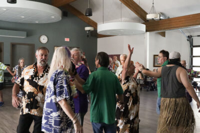 Attendees square dance at the Santa Clarita Sierra Hillbillies Square and Round Dance club's "Ohana Hawaiian Luau" at Valencia United Methodist Church in Valencia, Calif., Sunday, Aug. 2, 2026. Kamryn Martell/The Signal