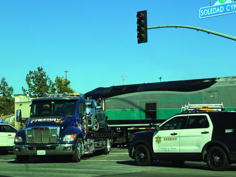 A Metrolink commuter train stuck a reportedly unoccupied car on the tracks late Monday afternoon, prompting a closure of the commuter rail line between the Santa Clarita and Antelope valleys and snarling traffic along Soledad Canyon Road just west of Canyon Country.  Kamryn Martell/The Signal
