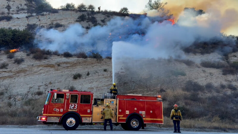 The Tasha Fire blazes through Sierra Highway and Neeham Ranch Parkway on Saturday evening. Signal Staff/The Signal