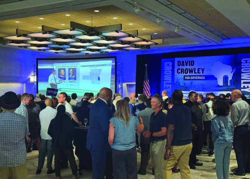 Supporters socialize and await results at a party hosted by Milwaukee County Executive David Crowley on Aug. 11, 2026. Photo by Joseph Lord.