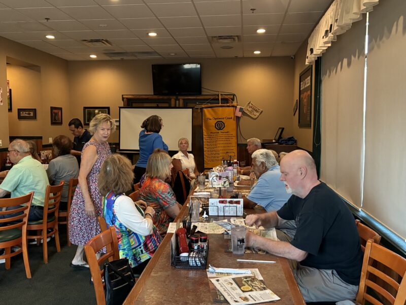 Attendees enjoy time together before the NourishNowCA presentation at the Santa Clarita Optimist Club meeting at Black Bear Diner in Valencia, Calif., Thursday, Aug. 10, 2026. Kamryn Martell/The Signal