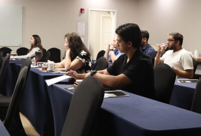 Attendees listen at the Santa Clarita Valley Chamber of Commerce's "The AI Advantage" seminar at 360 Suites SCV in Stevenson Ranch, Calif., Tuesday, Aug. 18, 2026. Kamryn Martell/The Signal