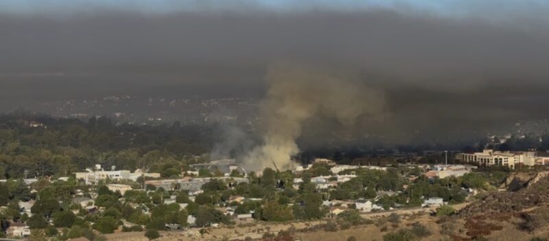 The Main Street fire in Old Town Newhall as seen from the intersection of Valle del Oro and Dockweiler Drive on Monday morning, Aug. 24, 2026. Signal staff photo.