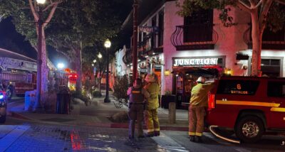 Firefighters battle the blaze that destroyed The Newhall Refinery restaurant on Main Street in the early hours of Monday, Aug. 24, 2026. Signal staff photo.