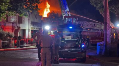 Firefighters battle the blaze that broke out at The Newhall Refinery restaurant on Main Street in the early hours of Monday, Aug. 24, 2026. Signal staff photo.