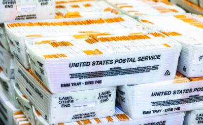 Voting ballots move forward in an audit process at the Orange County Registrars office in Santa Ana, Calif., on June 9, 2022. Photo by John Fredricks.