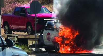 L.A. County Fire Department personnel responded to a flatbed truck fire on Tuesday at 3:31 p.m. on the northbound Interstate 5 offramp at Calgrove Boulevard. The fire was extinguished and firefighters closed the incident at 4 p.m. Photo by Heather Miller.