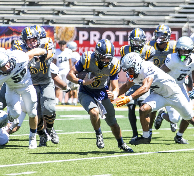 Canyons quarterback River Warren (6) carries the ball during the second quarter of Saturday's game against El Camino at College of the Canyons on Sept. 5, 2026. Habeba Mostafa/ The Signal