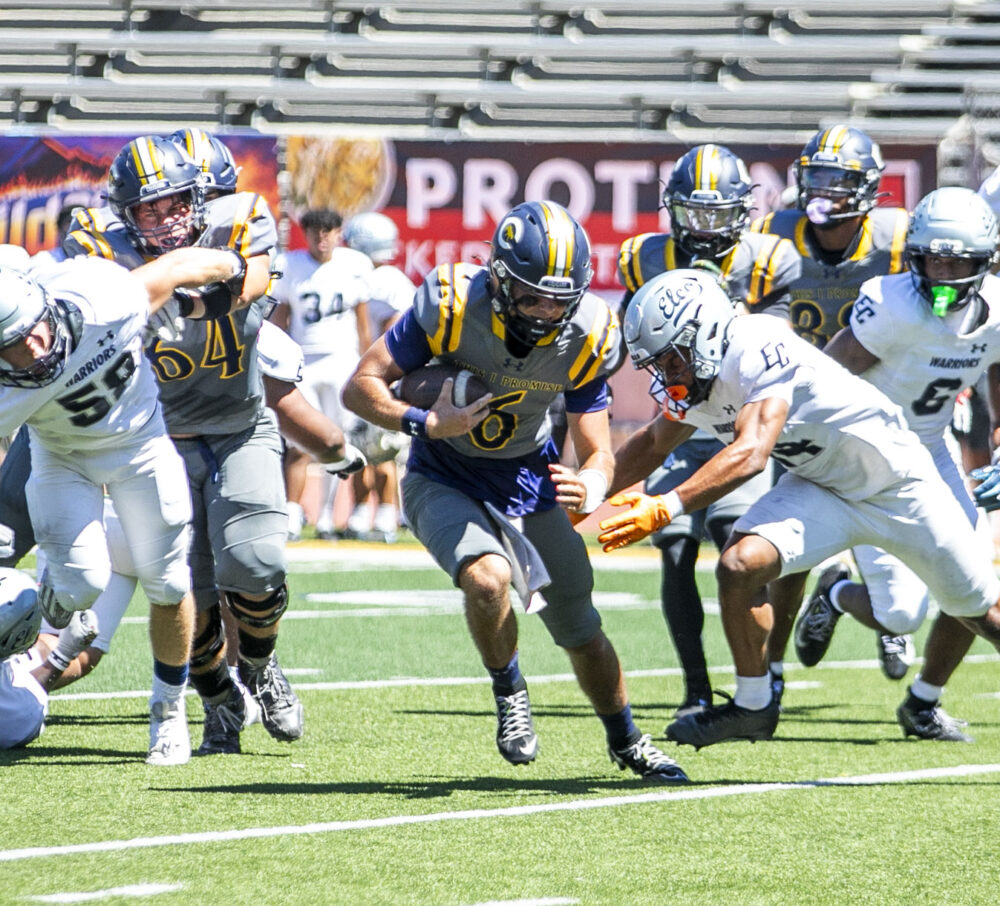 Canyons quarterback River Warren (6) carries the ball during the second quarter of Saturday's game against El Camino at College of the Canyons on Sept. 5, 2026. Habeba Mostafa/ The Signal