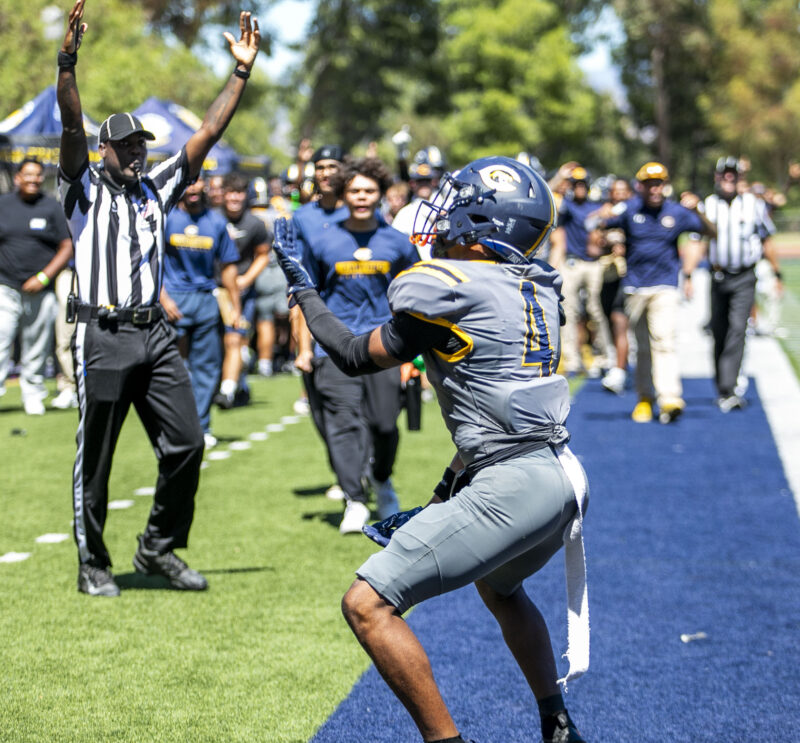 Canyons wide receiver Julian Treadwell (4) celebrates the touchdown during the second quarter of Saturday's game against El Camino at College of the Canyons on Sept. 5, 2026. Habeba Mostafa/ The Signal