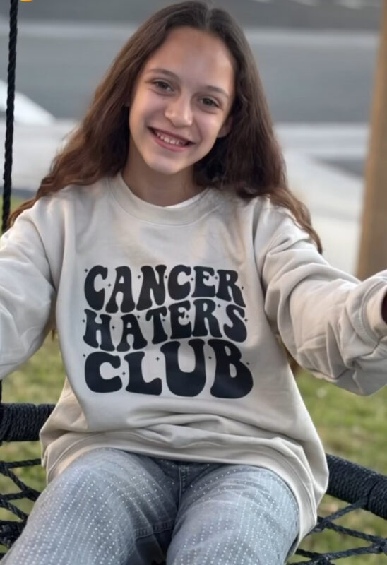 Brooklyn Hernandez, 12, wearing her "Cancer Haters Club." Photo courtesy of Tiffany Hernandez.