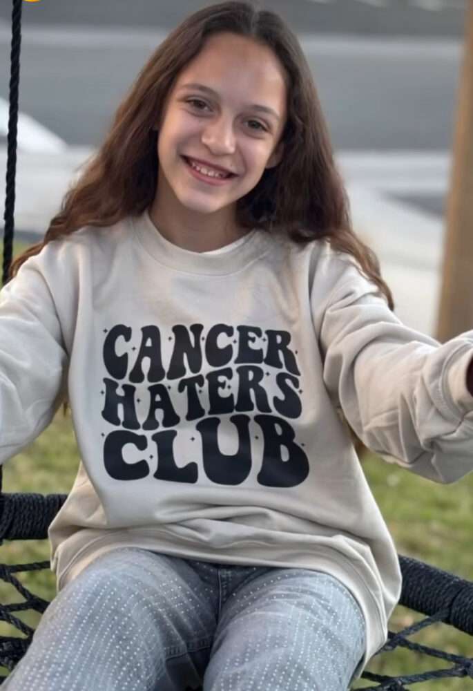 Brooklyn Hernandez, 12, wearing her "Cancer Haters Club." Photo courtesy of Tiffany Hernandez.