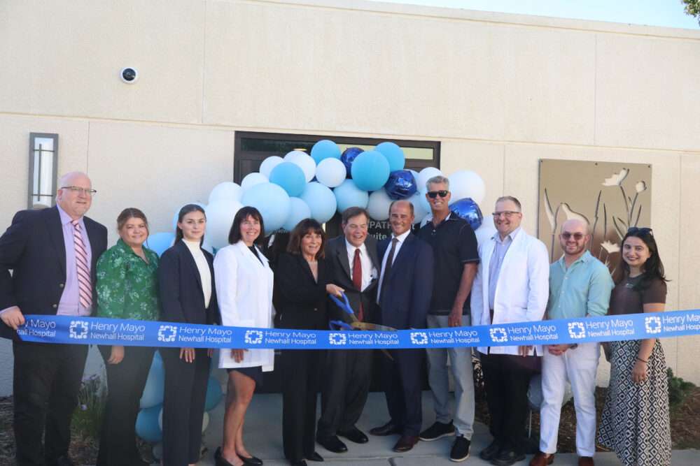 Local dignitaries and Henry Mayo Newhall Hospital workers prepare to cut the ribbon for the new Henry Mayo EmPATH Unit in Valencia, Calif., Monday, Sept. 14, 2026. Kamryn Martell/The SIgnal