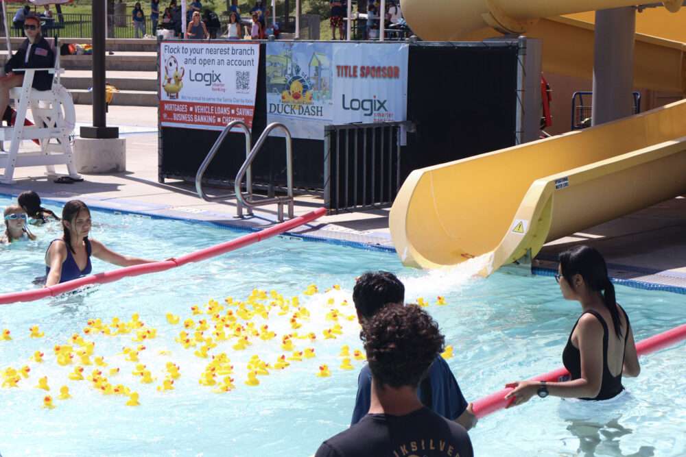 Ducks go down the slide at the Samuel Dixon Family Health Center's 23rd annual "Duck Dash" at the Santa Clarita Aquatic Center in Santa Clarita, Calif., Sunday, Sept. 20, 2026. Kamryn Martell/The Signal