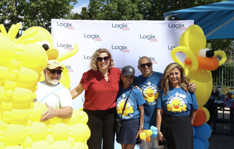 Assemblywoman Pilar Schiavo (red shirt), D-Chatsworth, poses with attendees and Samuel Dixon Family Health Center workers at the Samuel Dixon's 23rd annual "Duck Dash" at the Santa Clarita Aquatic Center in Santa Clarita, Calif., Sunday, Sept. 20, 2026. Kamryn Martell/The Signal