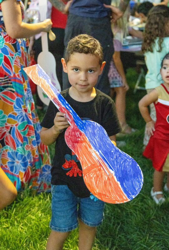 A boy shows off his guitar drawing at the final "Celebrate" event highlighting Mexico at Canyon Country Community Center, Thursday, Sept. 10, 2026. Chloe Miller/For The Signal