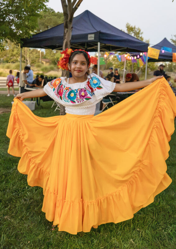 A dancer shows off her outfit at the final "Celebrate" event highlighting Mexico at Canyon Country Community Center, Thursday, Sept. 10, 2026. Chloe Miller/For The Signal