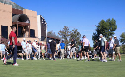 Attendees grab their golf balls after the mega-putt contest at the Chamber of Commerce's 42nd annual "Oak Tree Golf Classic" at Valencia Country Club in Valencia, Calif., Monday, Sept. 28, 2026. Kamryn Martell/The Signal