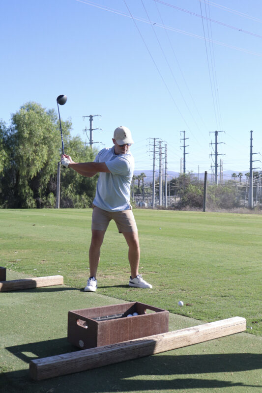 Dalton Hayes swings his golf club at the Chamber of Commerce's 42nd annual "Oak Tree Golf Classic" at Valencia Country Club in Valencia, Calif., Monday, Sept. 28, 2026. Kamryn Martell/The Signal