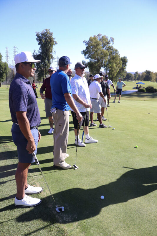 Attendees wait for the mega-putt contest at the Chamber of Commerce's 42nd annual "Oak Tree Golf Classic" at Valencia Country Club in Valencia, Calif., Monday, Sept. 28, 2026. Kamryn Martell/The Signal