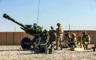 U.S. Soldiers with 2nd Platoon, Bravo Battery, 2-15 Field Artillery, 2nd Brigade Combat Team, 10th Mountain Division conduct an artillery live fire exercise at Al Asad Air Base, Iraq, on Dec. 1, 2023. U.S. Army photo by Staff Sgt. Quince Lanford/Public Domain