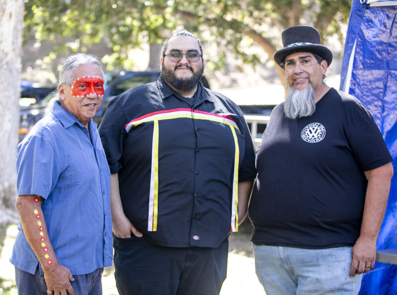 Dennis Garcia, left, Mark Villasenor, center, and Joe Bodle help facilitate the event during the Heart of Tataviam Pow Wow at Hart Park on Saturday, Oct. 3, 2026. Habeba Mostafa/ The Signal