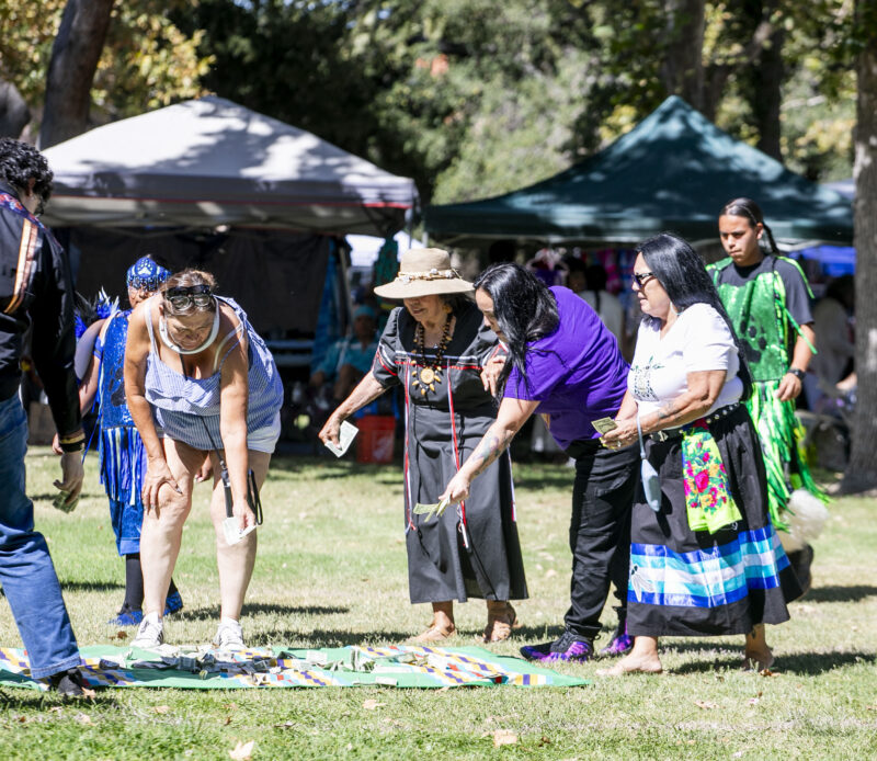 Attendees join in on the Blanket Dance to help "sinners" or those in need during the Heart of Tataviam Pow Wow at Hart Park on Saturday, Oct. 3, 2026. Habeba Mostafa/ The Signal