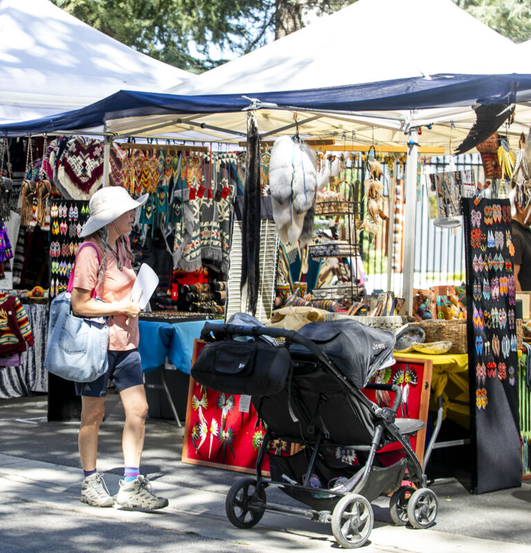 Attendees visit vendors selling homemade items during the Heart of Tataviam Pow Wow at Hart Park on Saturday, Oct. 3, 2026. Habeba Mostafa/ The Signal