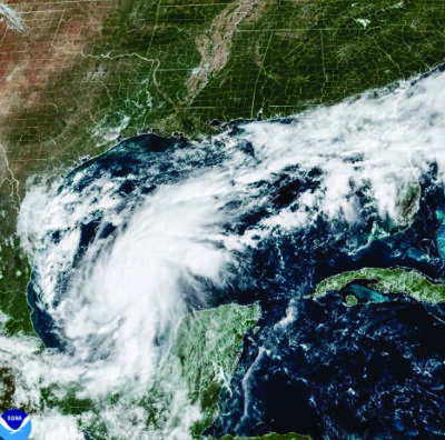 This satellite image from the National Oceanic and Atmospheric Administration shows Tropical Storm Isaias off the eastern coast of Mexico on Wednesday, Oct. 7, 2026. National Oceanic and Atmospheric Administration via AP