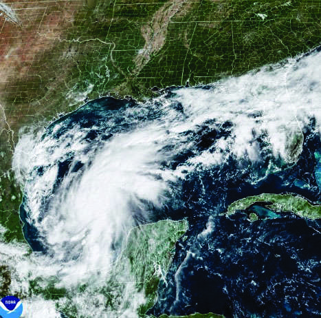 This satellite image from the National Oceanic and Atmospheric Administration shows Tropical Storm Isaias off the eastern coast of Mexico on Wednesday, Oct. 7, 2026. National Oceanic and Atmospheric Administration via AP