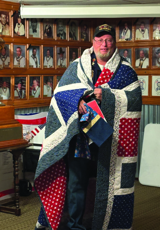 Santa Clarita Elks Lodge No. 2379 recently honored Larry Finley (left) with a quilt from the national nonprofit Quilt of Valor Foundation. Courtesy photo.