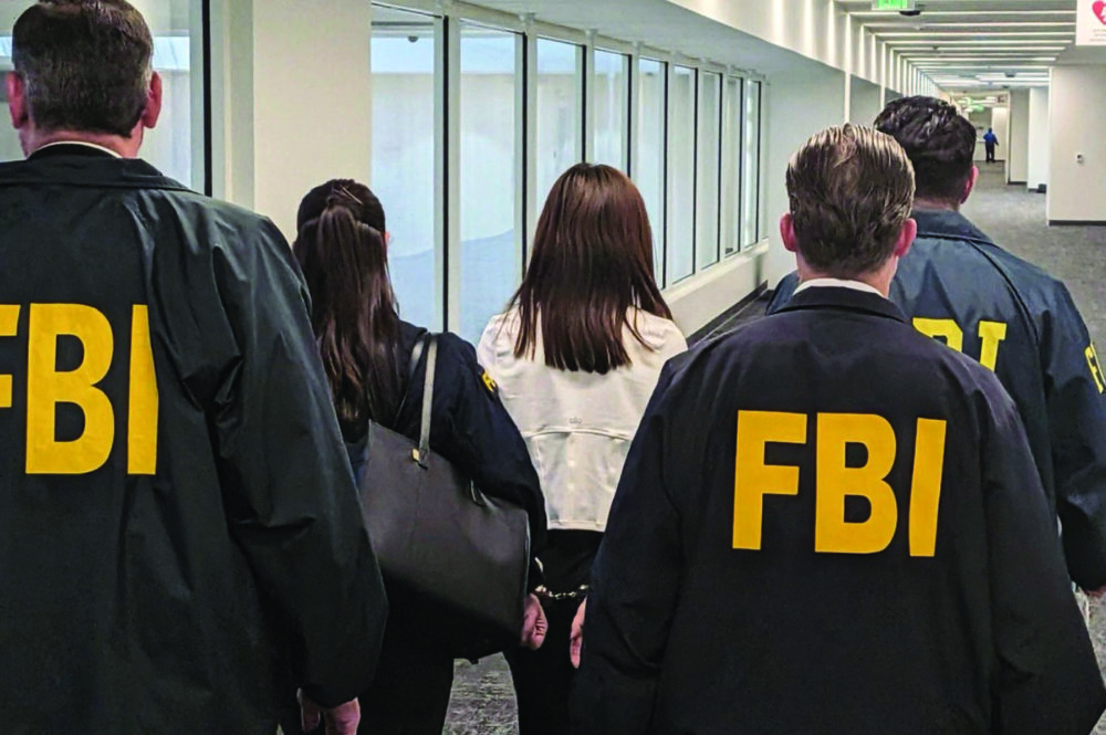 Wanying Zhang is arrested in Los Angeles on Oct. 4, 2026. Federal Bureau of Investigation via AP