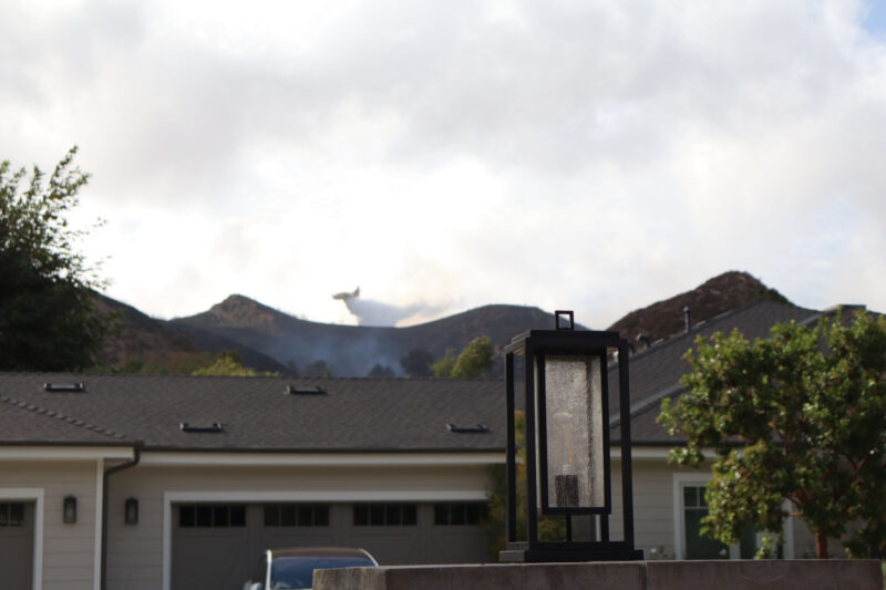 Superscoopers drop water onto the "Bike Fire" on the 16400 block of Cambria Estates Lane in Canyon Country, Calif., Sunday, Oct. 11, 2026. Kamryn Martell/The Signal