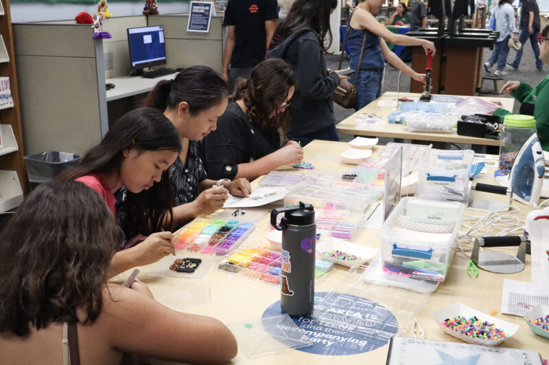 Attendees make things with beads at the Teen FanFest at the Canyon Country Jo Anne Darcy Library in Canyon Country, Calif., Friday, Oct. 9, 2026. Kamryn Martell/The Signal