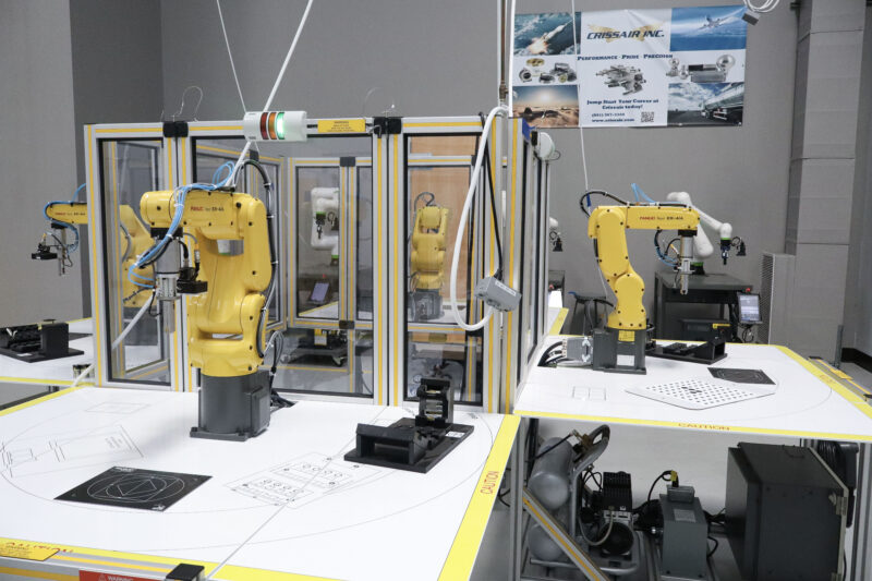 Fenced Robots are put on display for a demonstration at College of the Canyons' fourth annual Manufacturing Day at a facility in Santa Clarita, Calif., Friday, Oct. 9, 2026. Kamryn Martell/The Signal