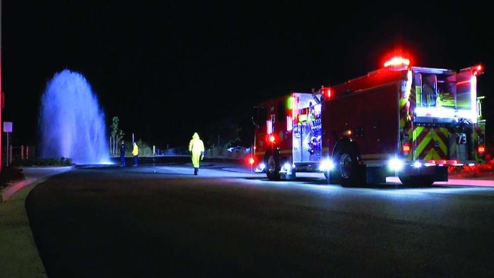 A sheared fire hydrant was reported Sunday night on Needham Ranch Parkway and Pioneer Way in Newhall, and no vehicle was on the scene when first responders arrived. Signal staff photo.